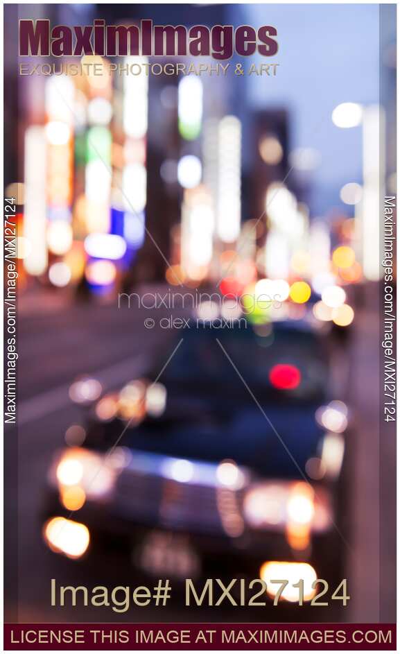 Abstract blurred city scenery of taxi cab in Tokyo