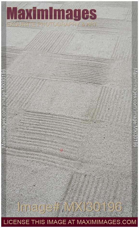 Abstract detail of the design on white gravel of a Japanese Zen garden