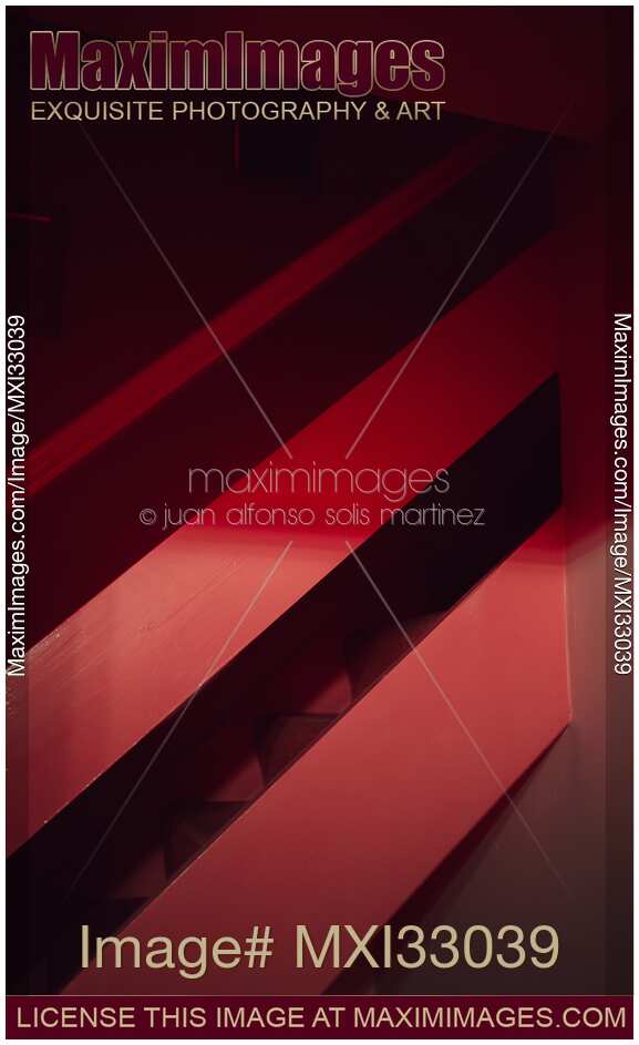 Abstract red lines of a painted metal staircase in London UK