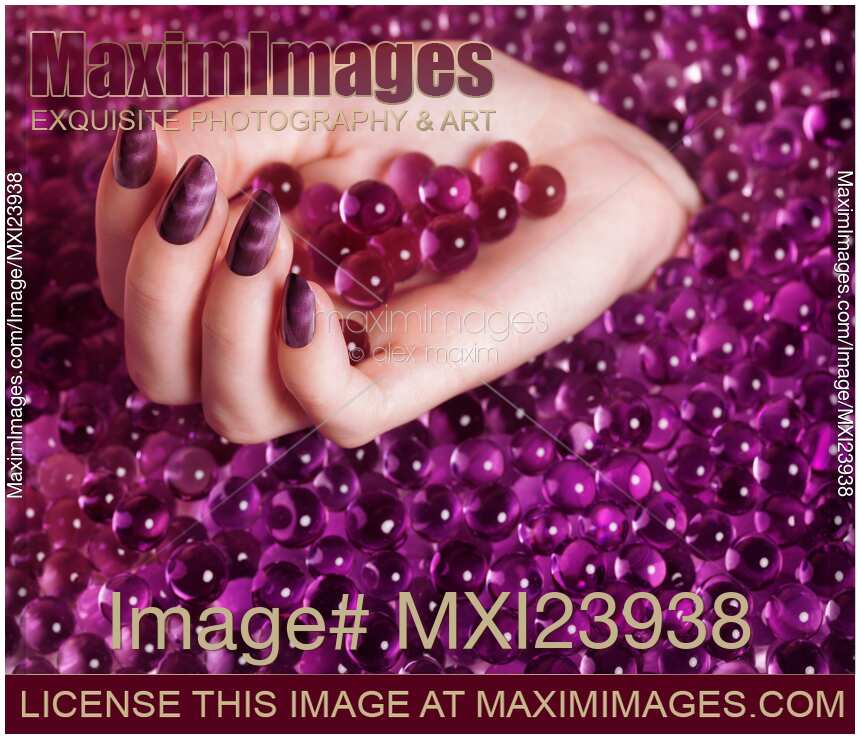 Abstract Woman Hand With Purple Nail Polish