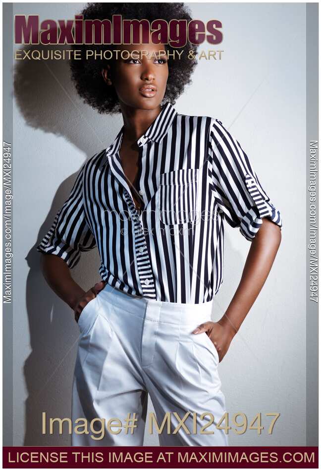 African american woman in black and white stylish clothes