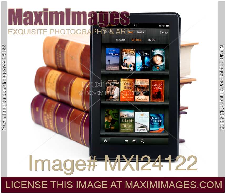 Amazon Kindle Fire leaning against books