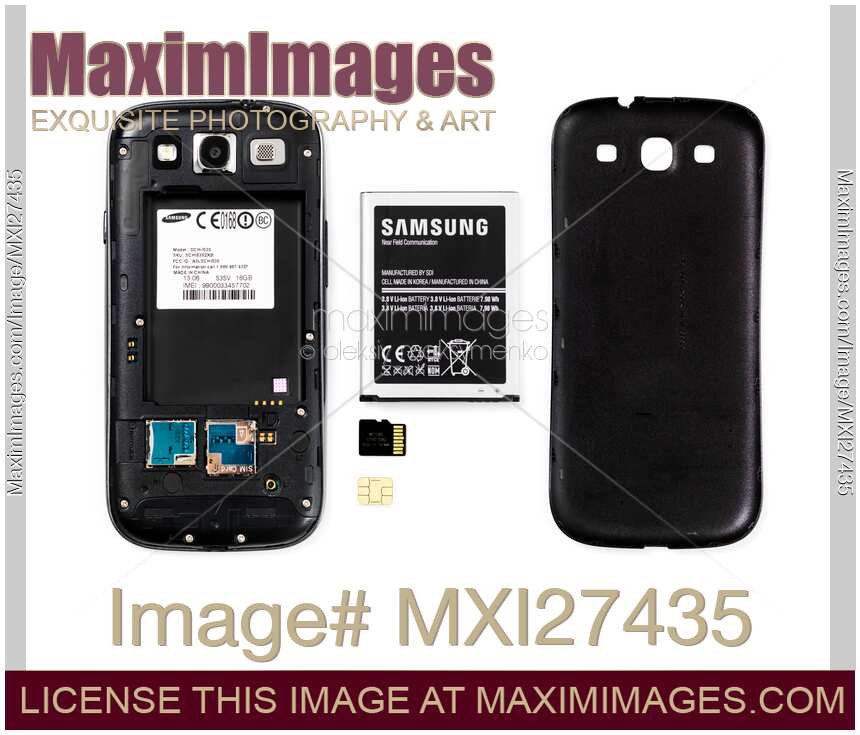Android phone with rear cover removed and parts taken out