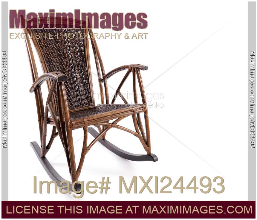 Antique wicker rocking chair isolated on white