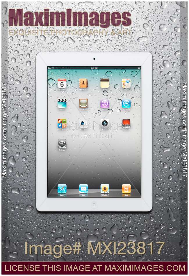 Apple iPad 2 Tablet Computer on Metal Background