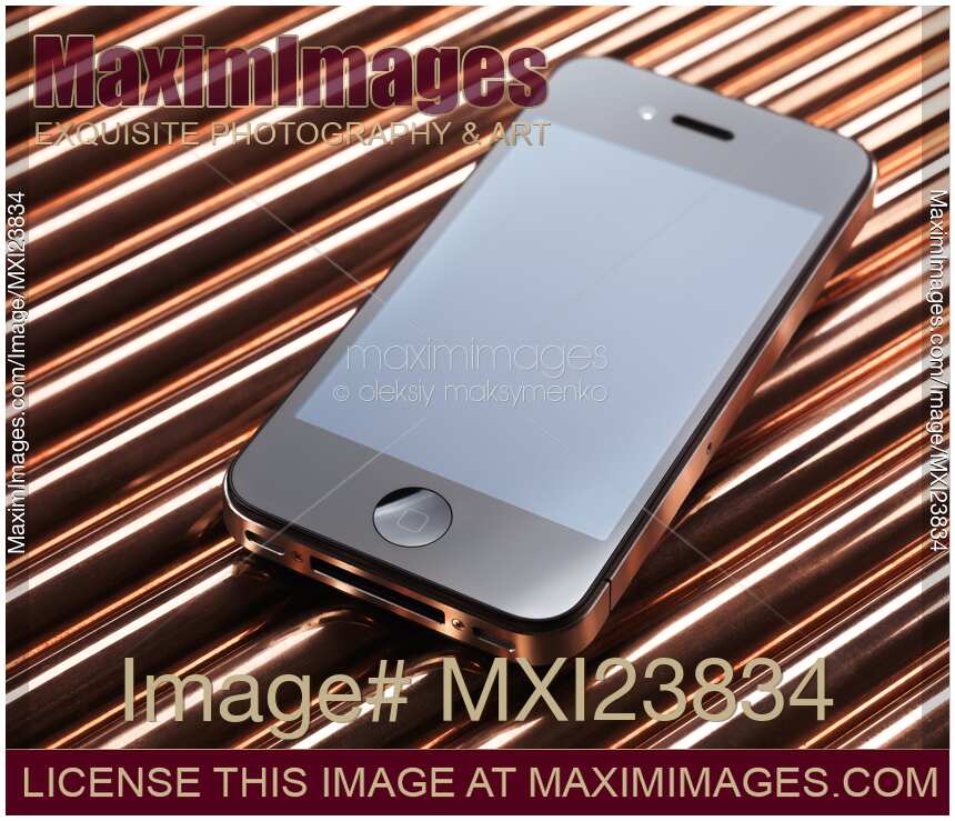 Apple iPhone 4 Smartphone on Shiny Red Metal