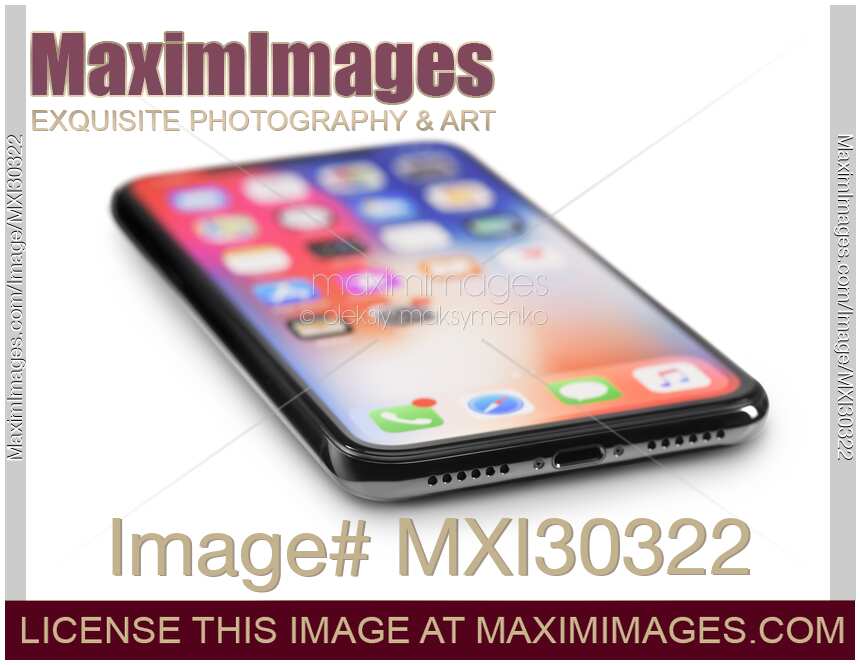 Apple iPhone X smartphone lying horizontally isolated on white background