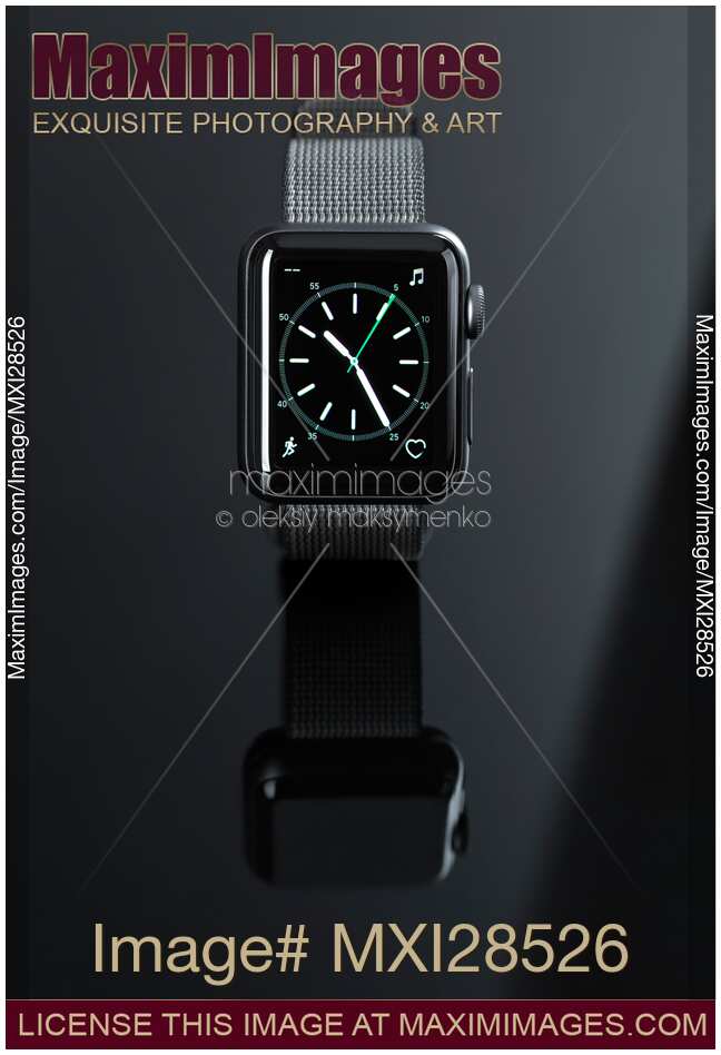 Photo of Apple Watch with clock on display Stock Image MXI28526