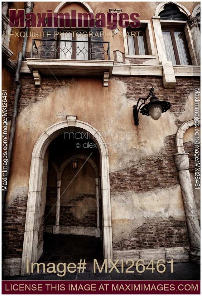Arched passage in old rustic Venetian house