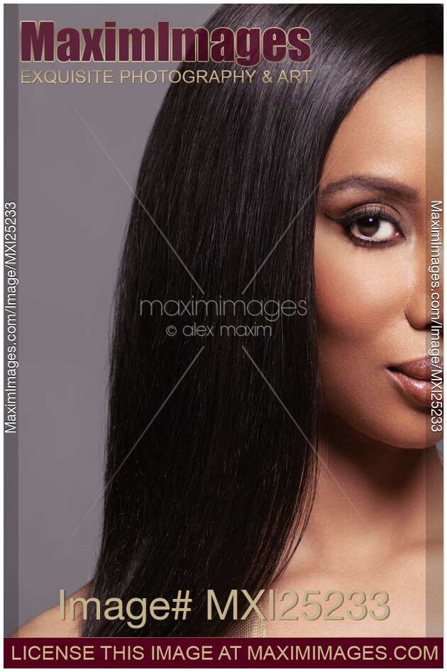 Artistic beauty portrait of black woman face with long straight hair