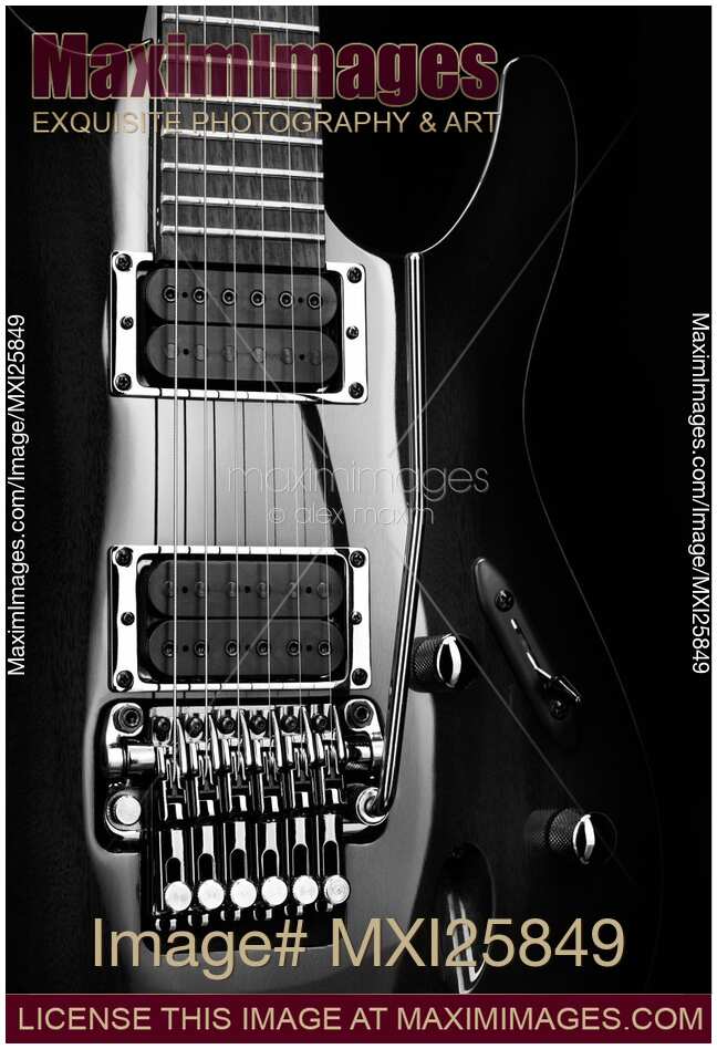 Artistic black and white closeup of electric guitar