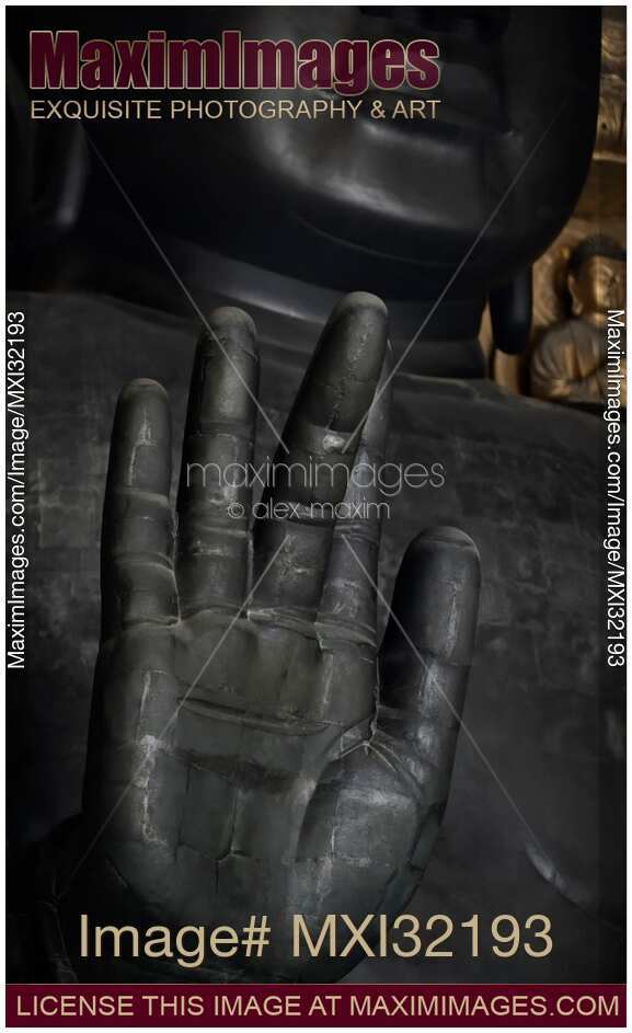Artistic closeup of the Great Buddha palm Semui-in or Abhaya mudra Todai-ji temple Japan