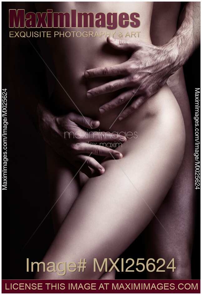 Artistic closeup sexy nude couple embracing