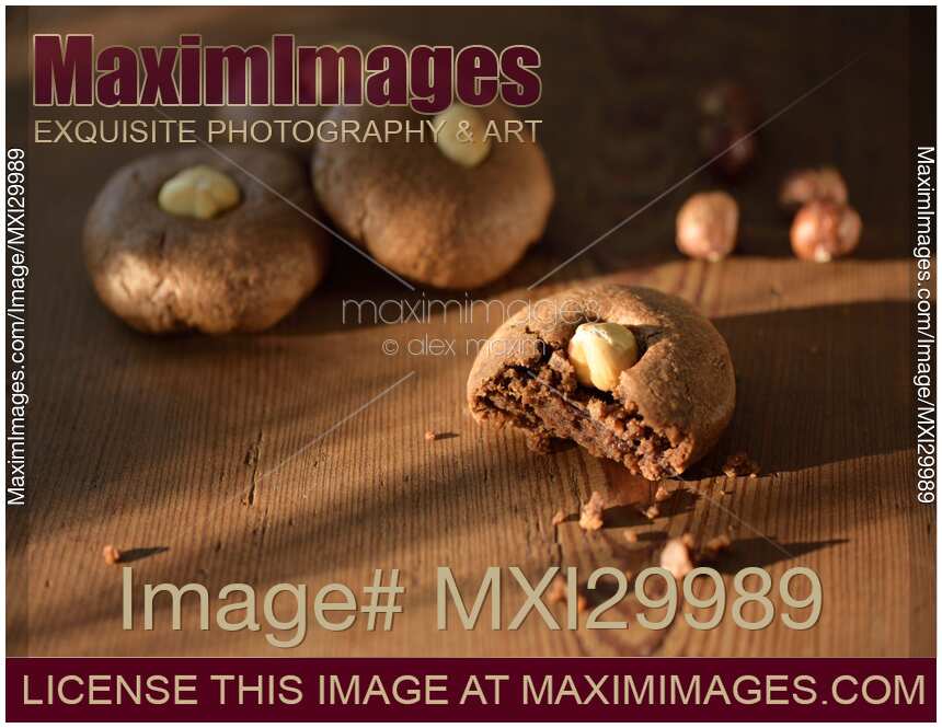 Artistic food still life of home-made Hazelnut butter cookies on rustic wood