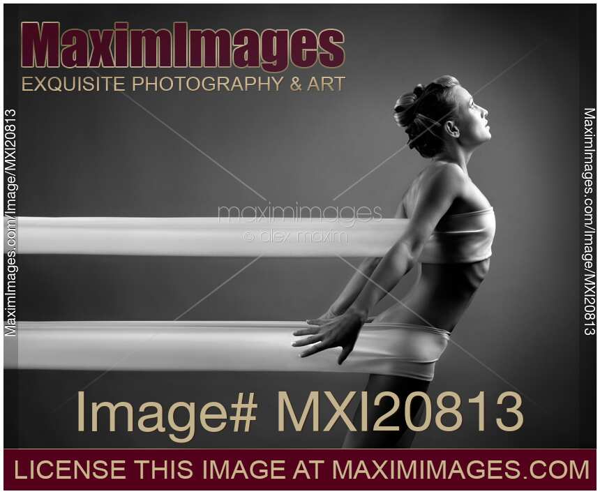 Artistic nude photo of woman reaching forward