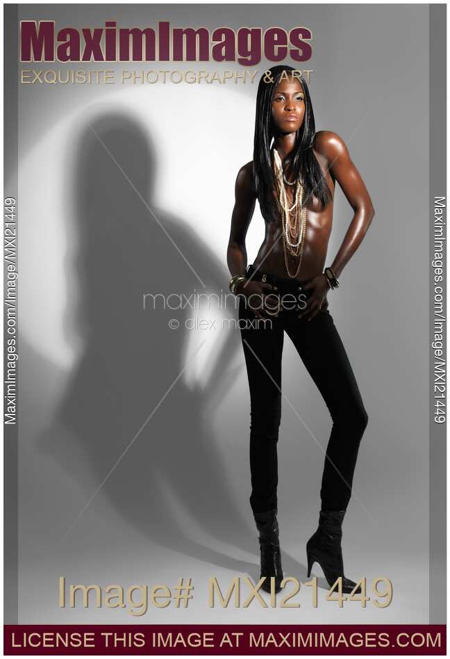 Attractive Woman Standing in a Spot Light