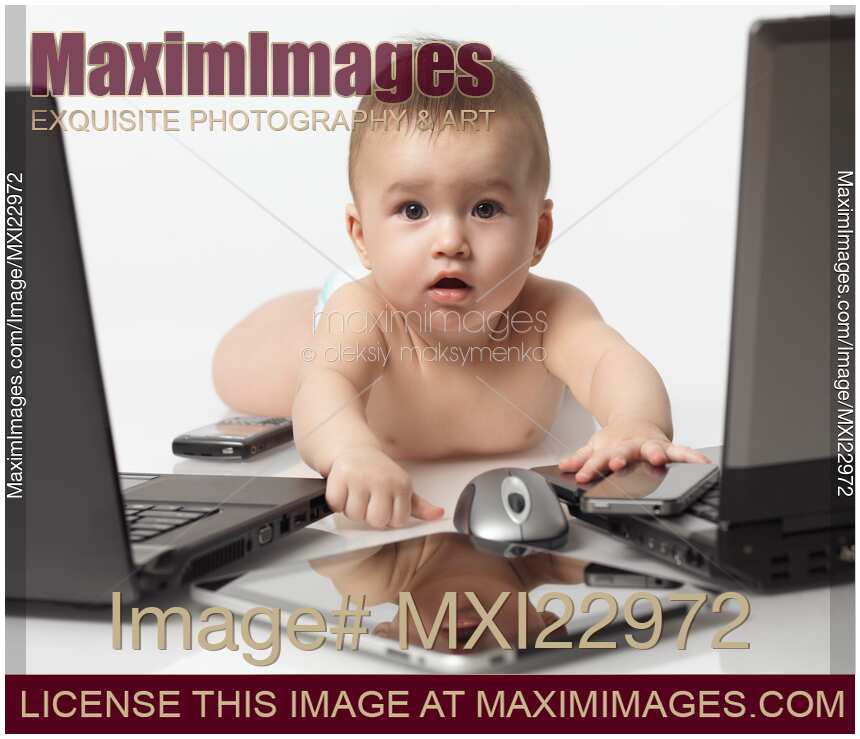 Baby amongst Computers and Electronics