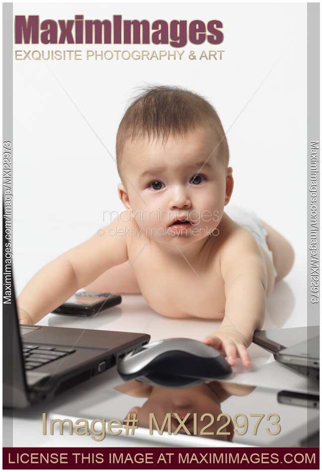Baby amongst Computers and Electronics