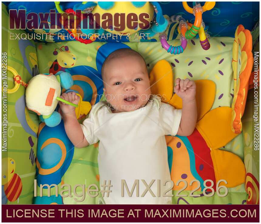 Baby Boy Lying on a Play Mat