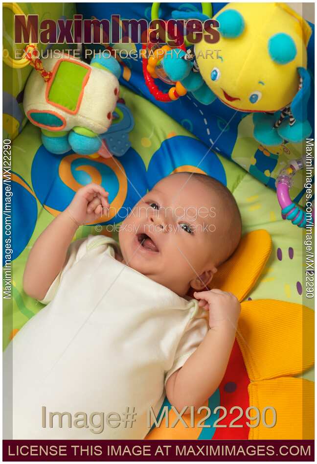 Baby Boy Lying on a Play Mat