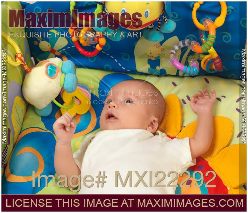 Baby Boy Lying on a Play Mat