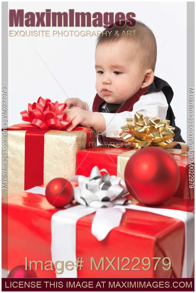 Baby Boy Opening Christmas Presents
