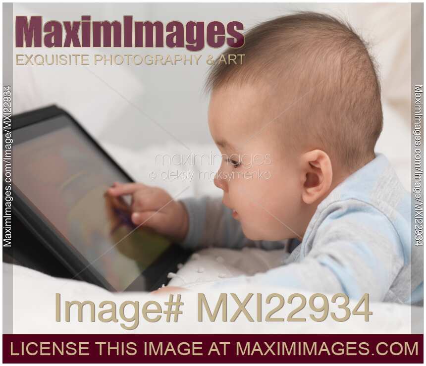 Baby Boy Playing with a Tablet Computer