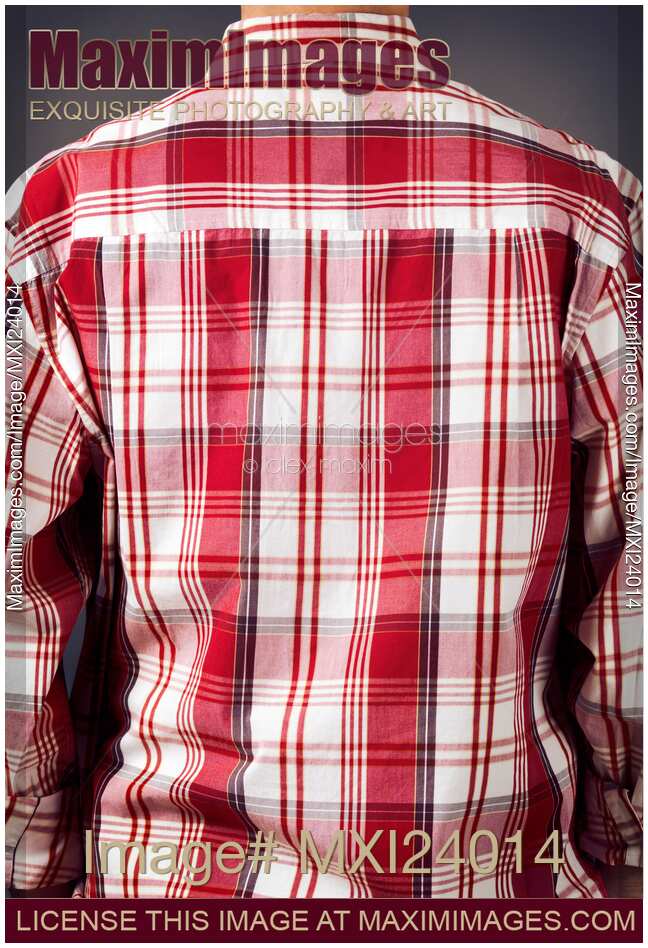 Back of a man wearing red tartan shirt