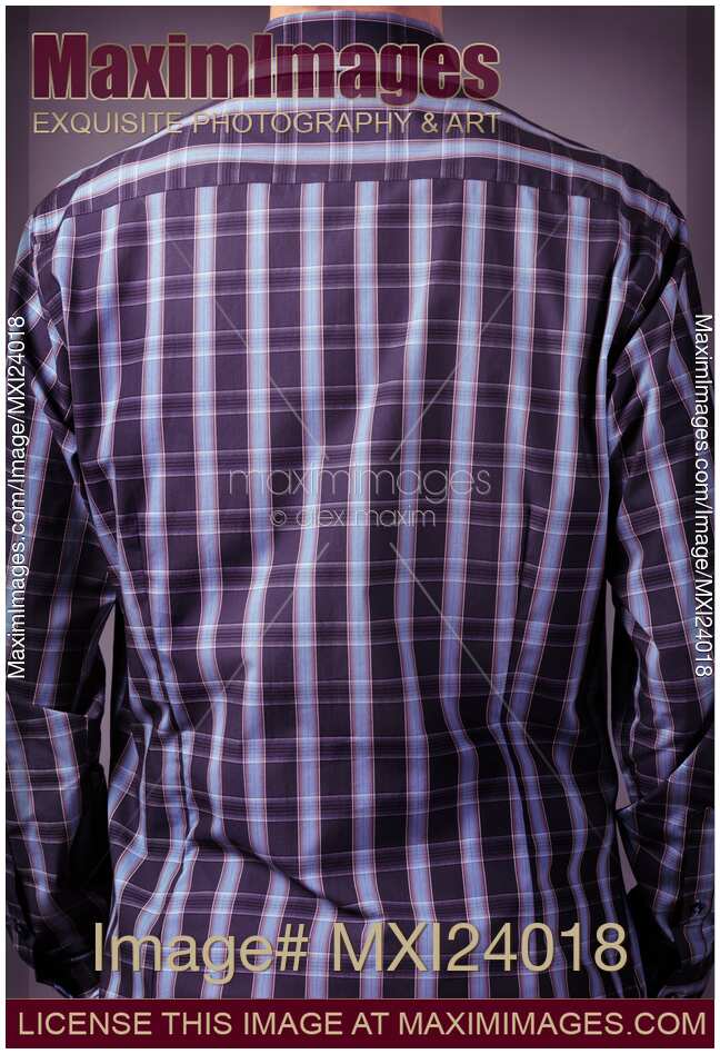 Back of a man wearing stylish blue tartan shirt