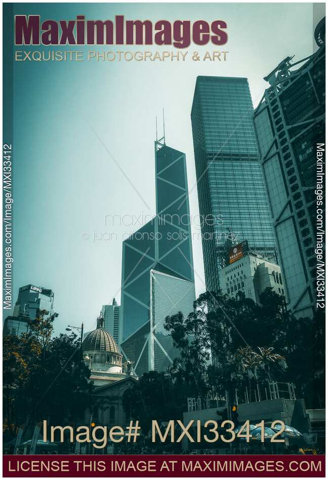 Bank of China Tower and modern buildings on streets of Hong Kong