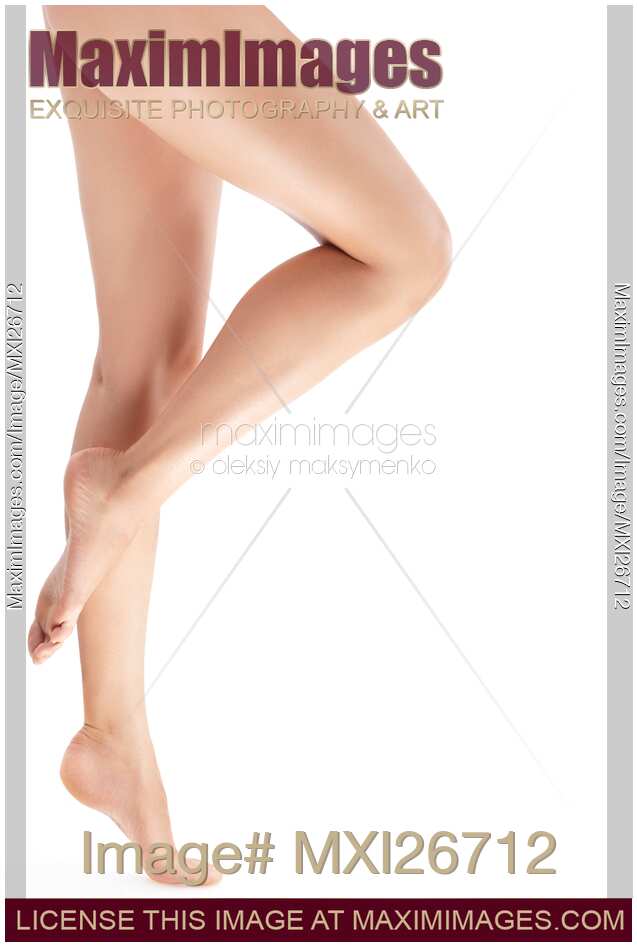 Bare legs of woman standing on tiptoe