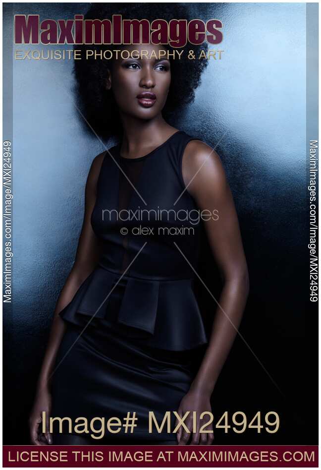 Beautiful african american woman in shiny black dress