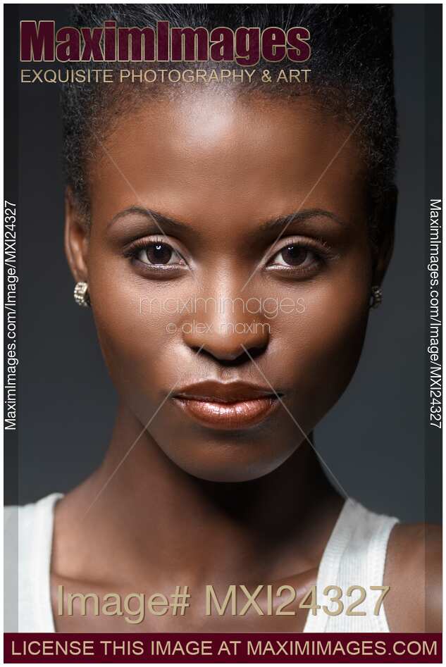 Stock photo beautiful african woman closeup face portrait