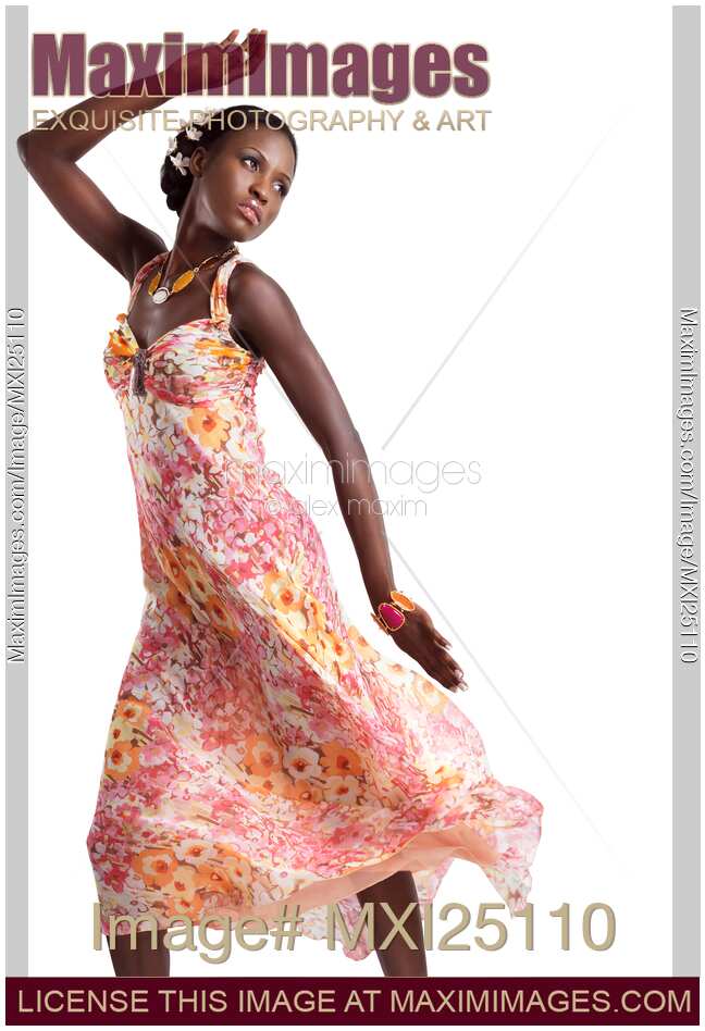 Beautiful african woman in pink floral dress