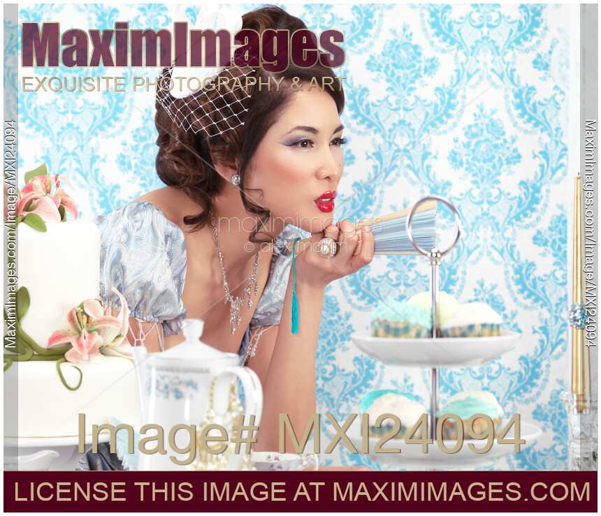 Beautiful asian lady at a tea party