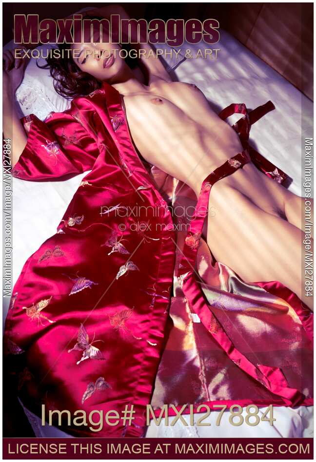 Beautiful asian woman sleeping naked in red kimono