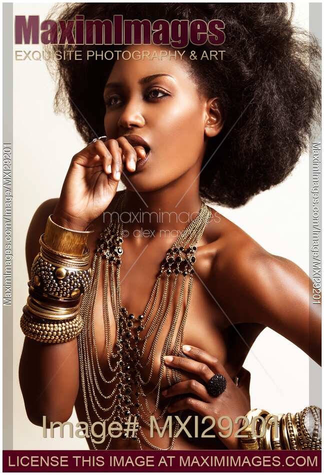 Beautiful Black African Woman Wearing Jewelry over her Bare Body