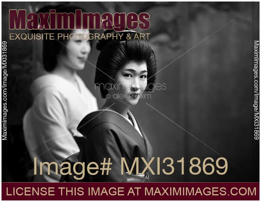 Beautiful Geisha Kyoto Geiko with an expressive look artistic black and white portrait