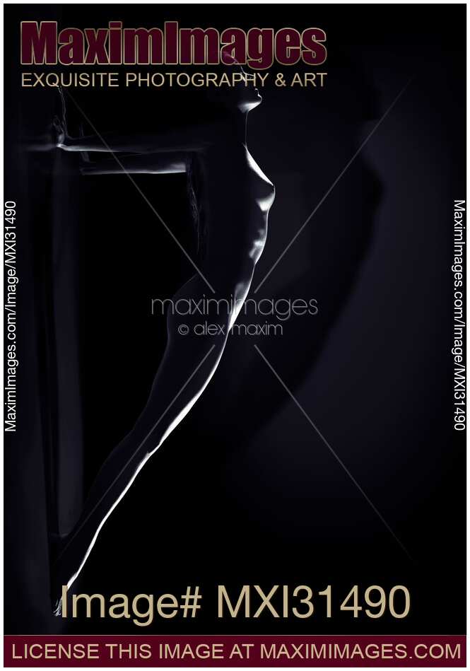 Beautiful naked woman body outline arched in a yoga plank against the wall Inspirational art nude
