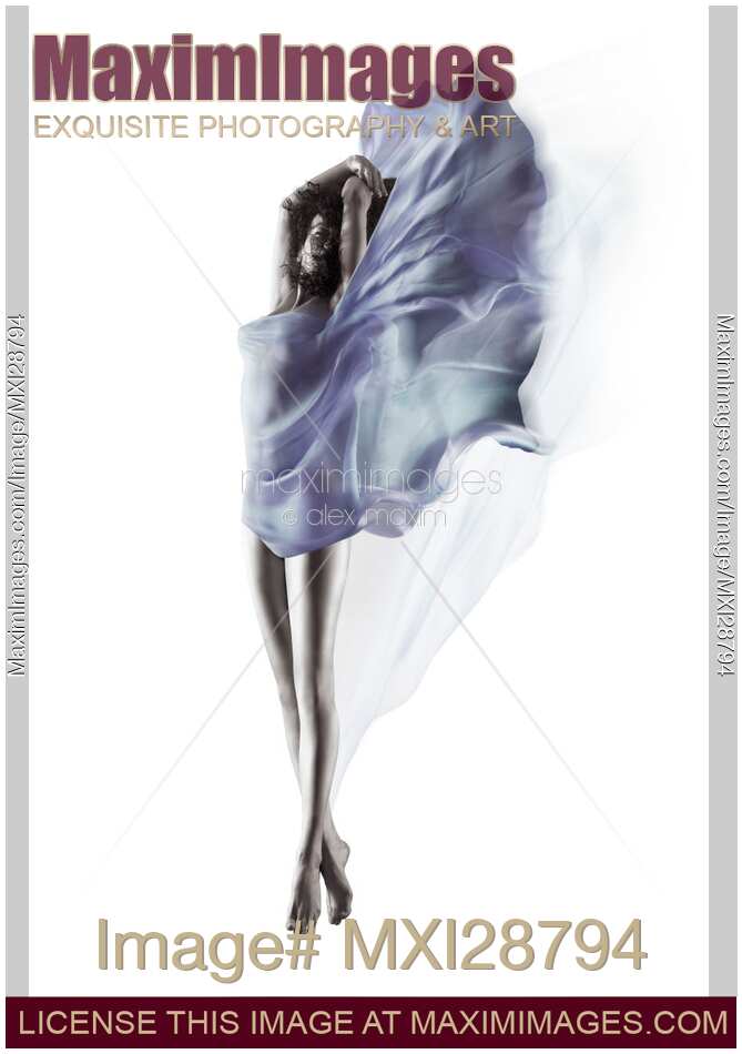 Beautiful nude woman with flowing blue sheer cloth wrapped around her naked body
