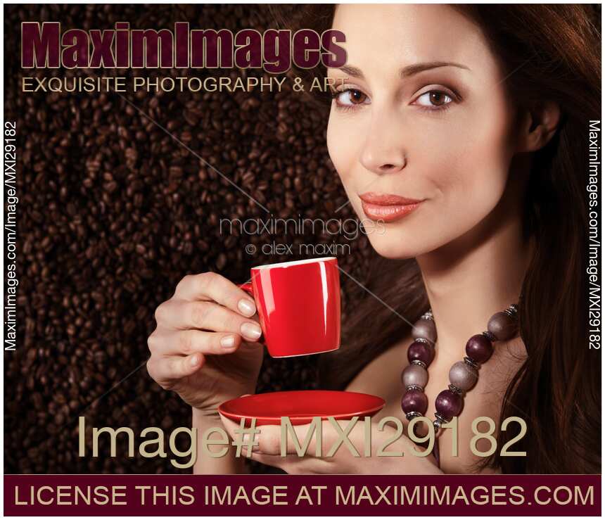 Beautiful smiling woman portrait with a cup of coffee