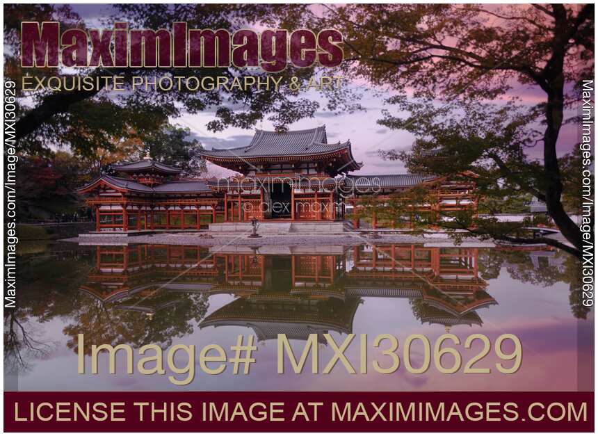 Beautiful sunrise scenery of Byodo-in temple Amida Phoenix hall reflecting in the clear water of the Pure Land garden pond