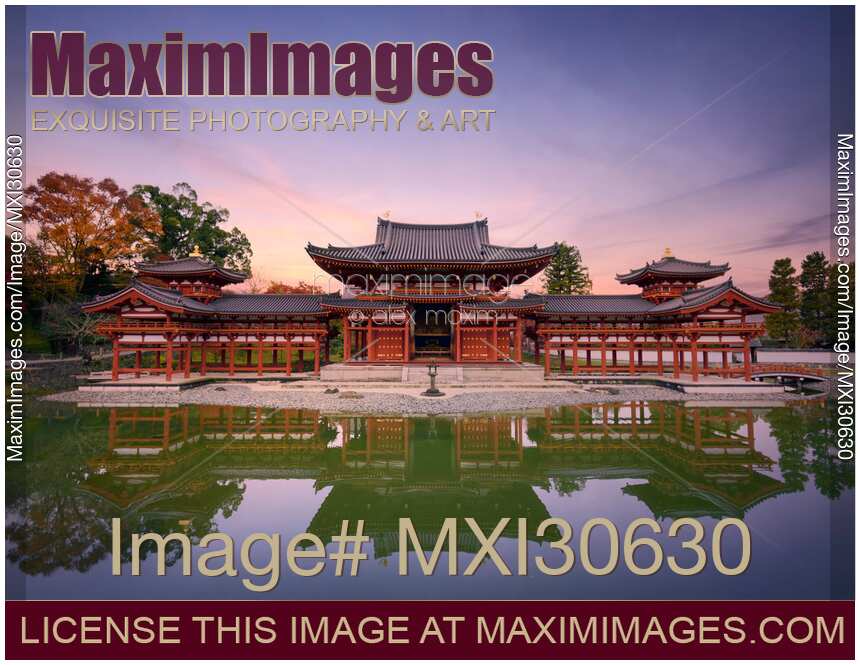 Beautiful tranquil scenery of the Phoenix Hall of Byodoin Japanese Buddhist temple reflecting in calm water of a pond