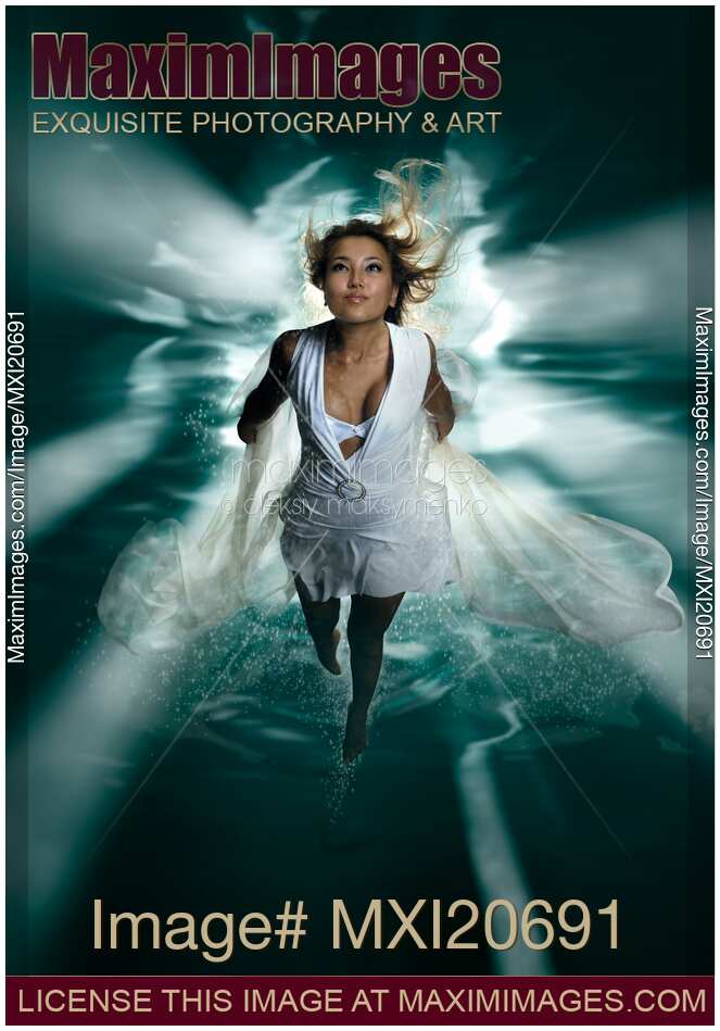 Beautiful Woman Diving in the Water