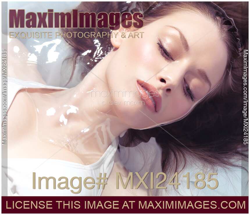 Beautiful woman face in water