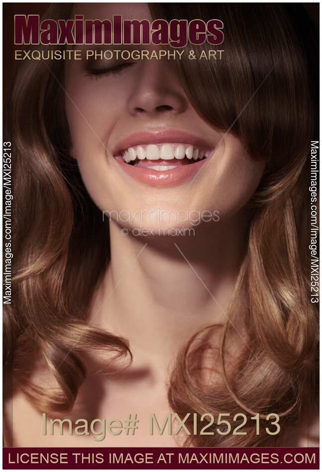 Beautiful woman face with full smile