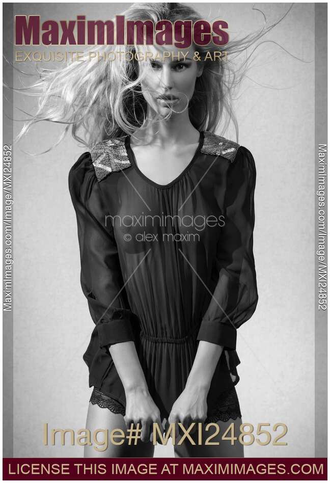 Beautiful woman in black see-through top Black and white
