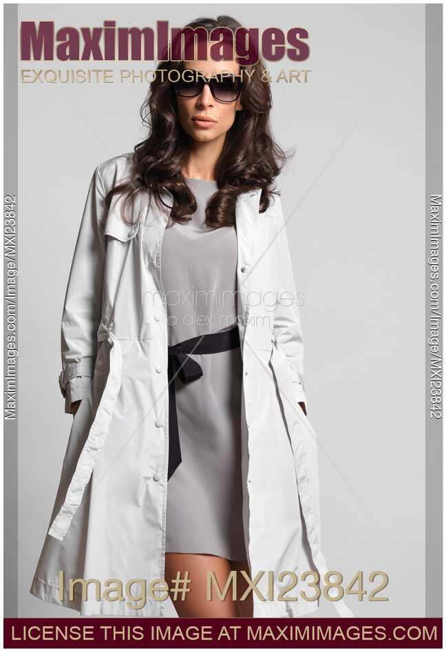 Beautiful Woman in Gray Trench Coat