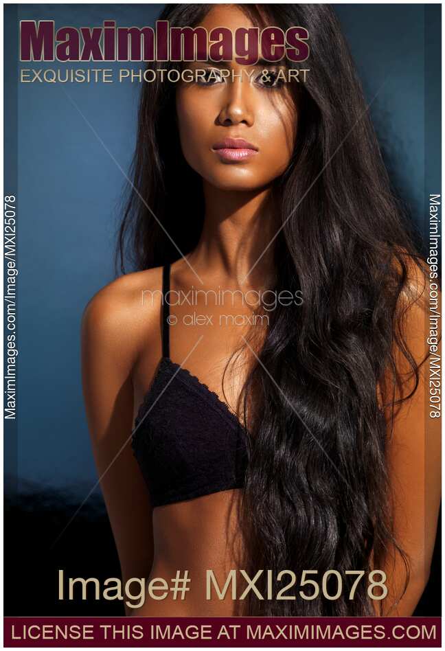 Beautiful woman in underwear with long dark hair