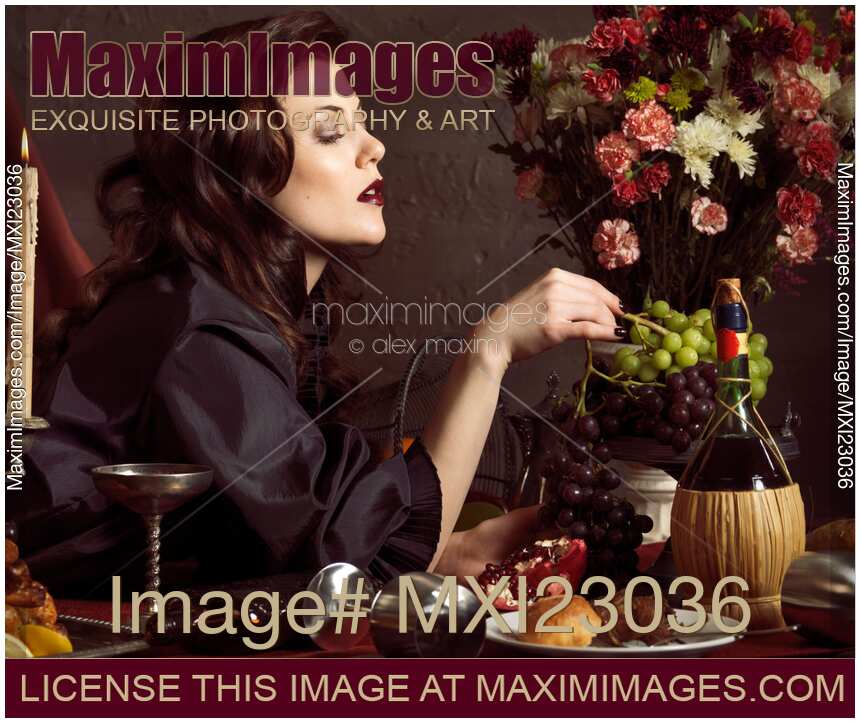 Beautiful Woman on a Festive Table